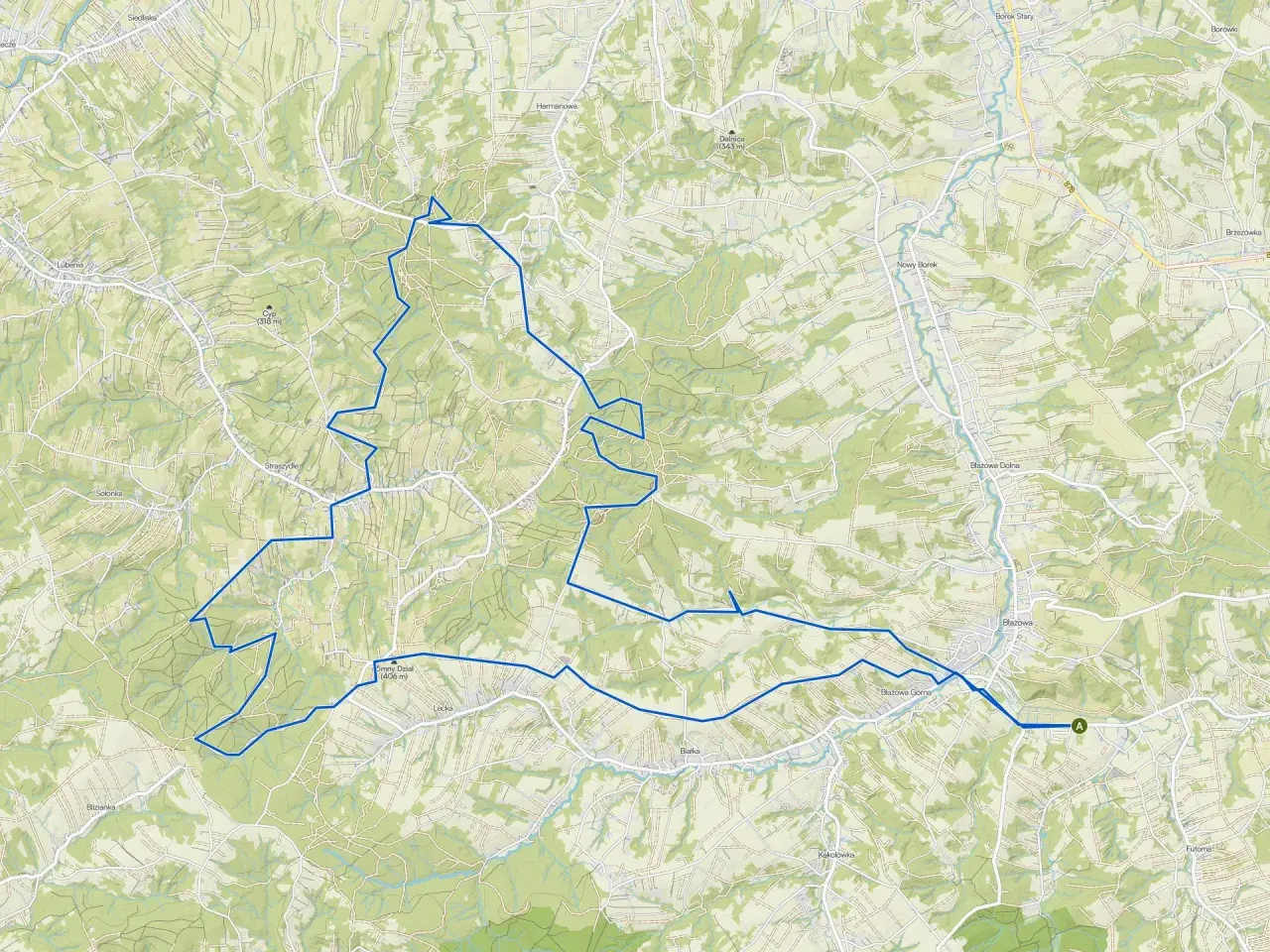 Mapa z zaznaczonymi trasami rowerowymi w okolicach Rzeszowa, prowadzącymi przez malownicze tereny z nazwami miejscowości jak Błażowa i Hermanowa.